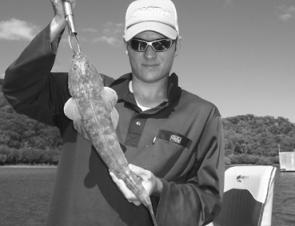 Jason Gustafson with a Corio Bay flathead.